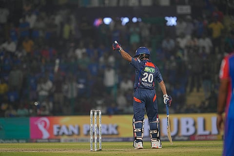 Mohd. Arshad Khan celebrates his fifty runs